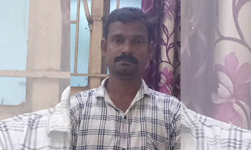 போலீஸ்காரரை தாக்கிய லாரி டிரைவர் கைது