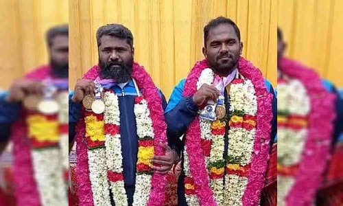 பளு தூக்கும் போட்டியில் சாதனை படைத்த அவிநாசி வீரா்களுக்கு பாராட்டு