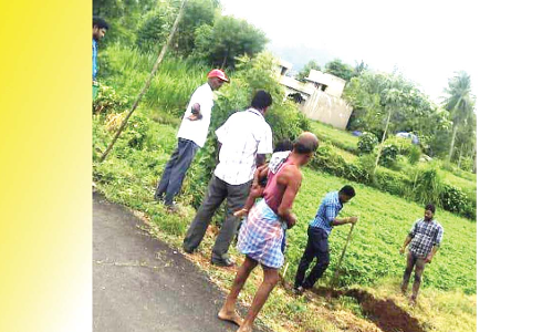 ரோட்டில் தாழ்வான மின் கம்பிகள் சீரமைப்பு