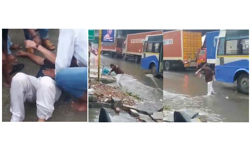 ஓசூரில் பரபரப்பு  கழிவுநீர் கால்வாய்க்குள் போதையில்  தள்ளாடி விழுந்த மதுப்பிரியர்