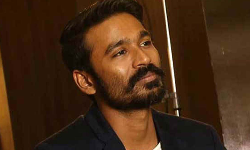 ரசிகர்களுடன் படம் பார்த்த நடிகர் தனுஷ்