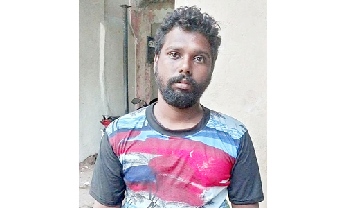 சப்-இன்ஸ்பெக்டர் கன்னத்தை கடித்த வாலிபர் கைது