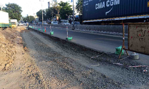 பல்லடத்தில் சாலை விரிவாக்க பணிகள் தீவிரம்