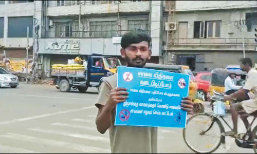 ஐகோர்ட்டு வழங்கிய நூதன தண்டனை: அண்ணாசாலையில் வாலிபர் விழிப்புணர்வு பிரசாரம்