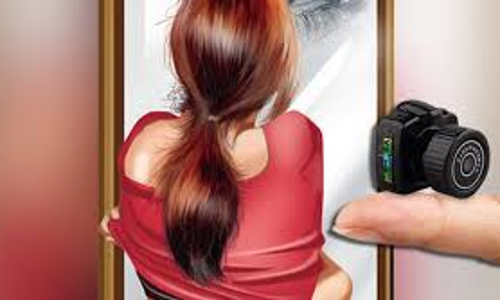 பெண்ணை ஆபாசமாக படம் பிடித்த வாலிபர் கைது