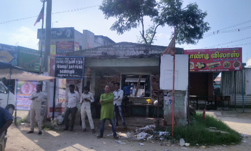 அன்னூர் கணேசபுரத்தில் குப்பை கூடமாக மாறிய பயணிகள் நிழற்குடை