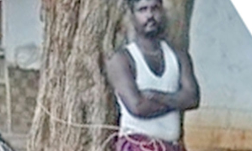 நத்தம் அருகே கடனுக்காக தொழிலாளியை மரத்தில் கட்டி வைத்து தாக்கிய கொடூரம்