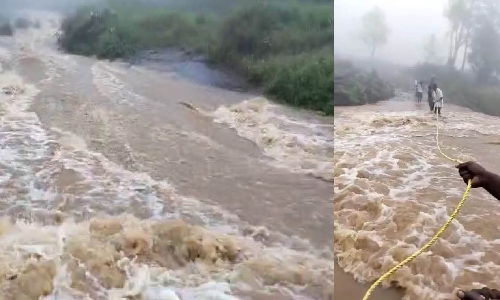 கொடைக்கானலில் காட்டாற்று வெள்ளம்- கயிறு கட்டி ஆற்றை ஆபத்தான முறையில் கடந்த மக்கள்