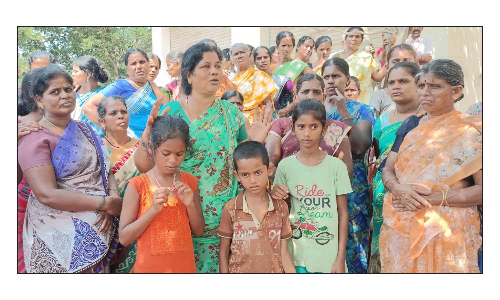 அரூர் அருகே விஷம் குடித்து தற்கொலை செய்த   பெண்ணின் உறவினர்கள் நடவடிக்கை எடுக்க கோரிக்கை
