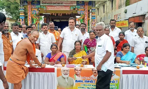 அம்பையில் மதுபான கடையை அகற்ற கோரி பா.ஜ.க.வினர் கையெழுத்து இயக்கம்