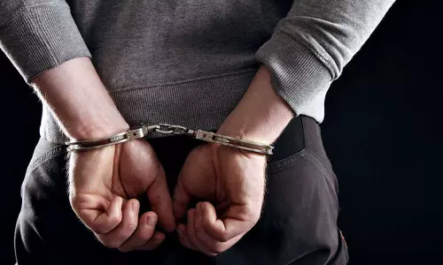 சப்- இன்ஸ்பெக்டருக்கு கொலை மிரட்டல் விடுத்தவர் கைது