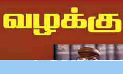 பாளையில்  டிராக்டரில் கழிவுகள் கொண்டு  வந்த 2 பேர் மீது வழக்கு