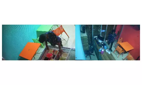 திருடி விட்டு சாவகாசமாக ஐஸ்கிரீம் சாப்பிட்டு விட்டு செல்லும் திருடன்