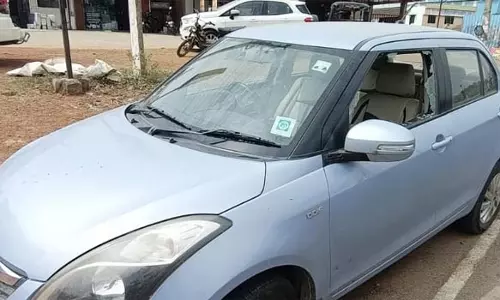 பெரியபாளையத்தில் பட்டப் பகலில் கார் கண்ணாடியை உடைத்து ரூ.2 லட்சம் கொள்ளை