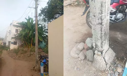 உயிர் பலி வாங்க காத்திருக்கும் மின்கம்பம்