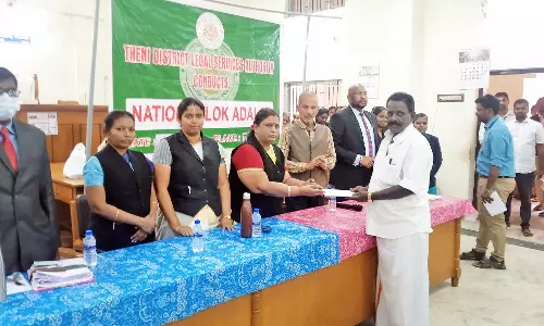 தேனியில் நடந்த தேசிய மக்கள் நீதிமன்றத்தில் 2010 வழக்குகளுக்கு தீர்வு