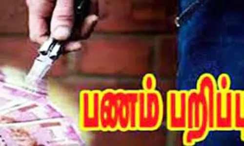 தொழிலாளியிடம் பணம் பறித்தவர் கைது