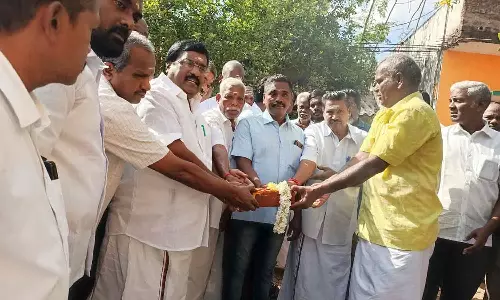 ரூ. 9 லட்சம் செலவில் கழிவுநீர் வாய்க்காலுடன் சாலை அமைக்கும்  பணி-எதிர்க்கட்சித் தலைவர்  சிவா தொடங்கி வைத்தார்