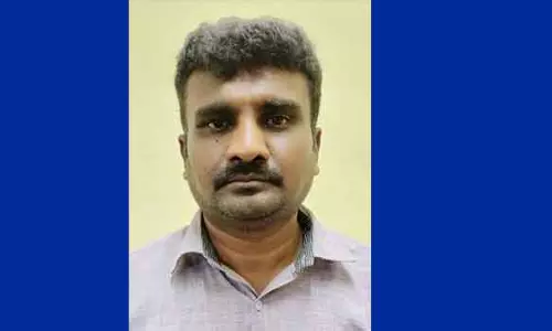 பெண்ணிடம் ரூ.7 லட்சம் மோசடி செய்த அரசு ஊழியர் கைது