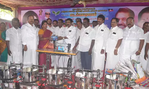 அ.தி.மு.க.வினர் நலத்திட்ட உதவி வழங்கி  கொண்டாட்டம்