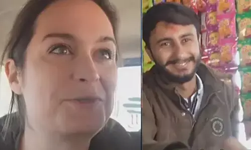 இந்தியாவில் ரெயில் பயணத்தின் போது அமெரிக்க பெண் தொலைத்த பணப்பையை மீட்டு கொடுத்த குஜராத் வாலிபர்