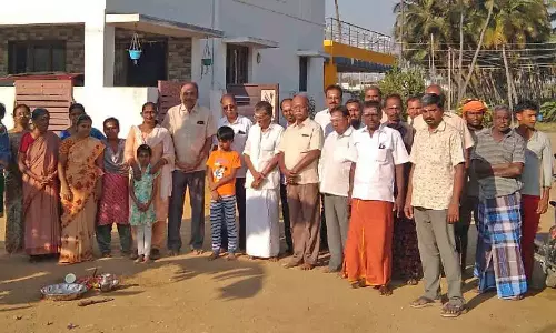 பொங்கலூரில் தார் சாலை அமைக்க பூமி பூஜை