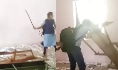 அரசு பள்ளியில் மேஜை, மின்விசிறிகளை மாணவர்கள் அடித்து நொறுக்கிய விவகாரம்- கல்வித்துறை அதிகாரிகள் விசாரணை