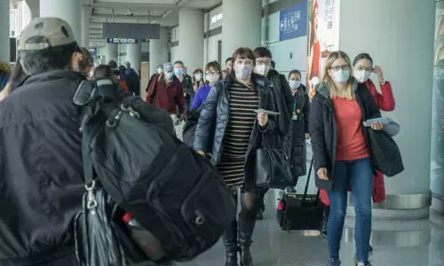 கொரோனா கட்டுப்பாடுகள் நீக்கம்- வெளிநாட்டினருக்கு சீன விசா வழங்குவது மீண்டும் தொடக்கம்