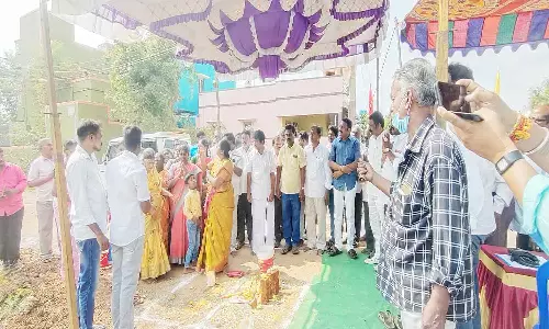 தார் சாலை, சிறுபாலம் அமைக்க பூமி பூஜை