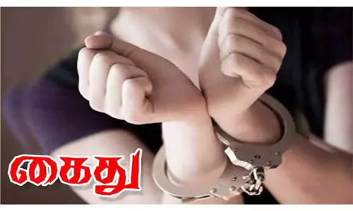 வக்கீலுக்கு கொலை மிரட்டல் விடுத்த பெண் கைது