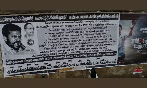 தி.மு.க. நிர்வாகிகளை வன்கொடுமை சட்டத்தில் கைது செய்ய கோரி விடுதலை சிறுத்தைகள் போஸ்டர்- அரசியல் கட்சியினர் இடையே பரபரப்பு