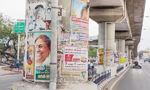 மேம்பாலங்கள்-பொது கட்டிடங்களை அலங்கோலமாக்கும் போஸ்டர்கள்