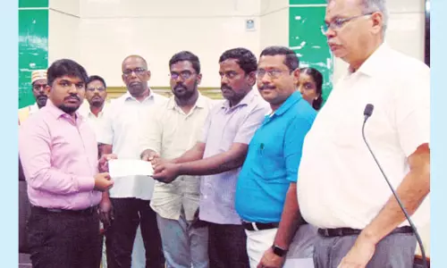 நியாய விலை கடை விற்பனையாளர் குடும்பத்துக்கு நிதியுதவி