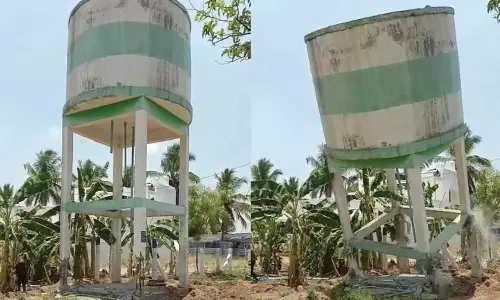 அன்னூரில் சேதம் அடைந்த குடிநீர் தேக்க தொட்டி இடித்து அகற்றம்