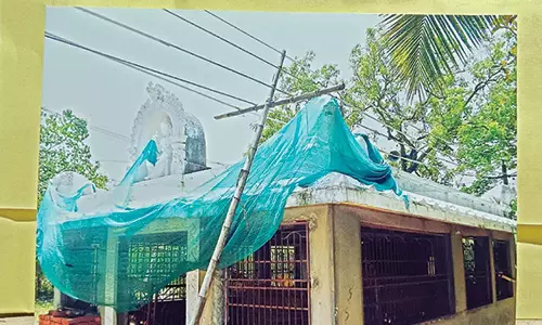 பெரம்பூர் கோவில் மீது தாழ்ந்து செல்லும் மின்கம்பிகளை மாற்ற வேண்டும்