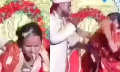 மணமகளை மணமேடையில் அடித்து துவைத்த மணமகன்