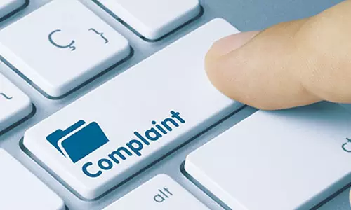 போலியாக வாகன நிறுத்தம் டோக்கன் கொடுத்து கட்டாய பணம் வசூல்- கோவில் நிர்வாகத்தினர் போலீசில் புகார்