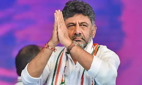 காங்கிரஸ் ஆட்சியை பிடிக்கும் என எனது ரத்தத்தில் எழுதி தருகிறேன்: எடியூரப்பாவுக்கு டி.கே.சிவக்குமார் பதிலடி