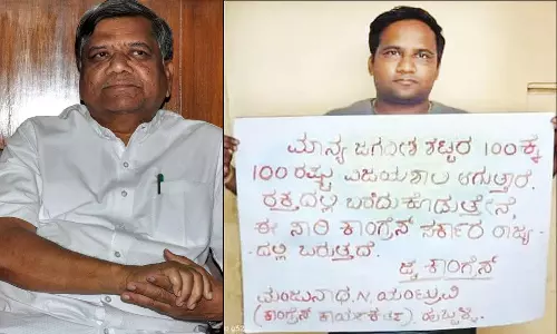 ஜெகதீஷ் ஷெட்டர் 100 சதவீதம் வெற்றி பெறுவார் என ரத்தத்தில் எழுதிய ரசிகர்