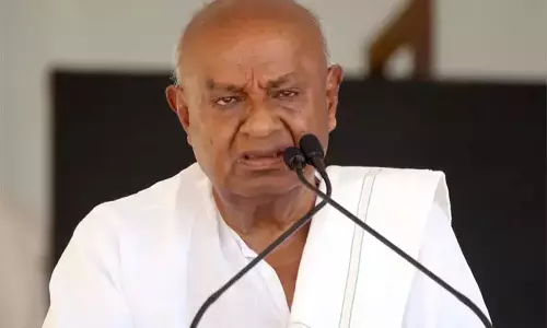 கர்நாடக சட்டசபை தேர்தலில் பா.ஜனதாவும், காங்கிரசும் கூட்டணி: தேவகவுடா பரபரப்பு பேச்சு