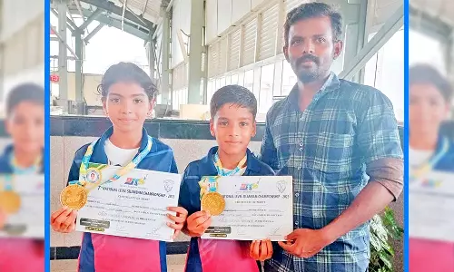 தேசிய அளவிலான சிலம்ப போட்டியில் ஆலங்குளம் அரசு பள்ளி மாணவன், மாணவி சாதனை