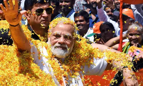 ஆளுங்கட்சியின் எதிர்ப்பு அலையை சமாளிக்க மோடியின் புகழை நம்பியுள்ள கர்நாடக பா.ஜனதா