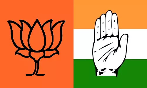 கர்நாடகாவில் தொங்கு சட்டசபை? குமாரசாமி ஆதரவை பெற பாஜக - காங்கிரஸ் தீவிர முயற்சி