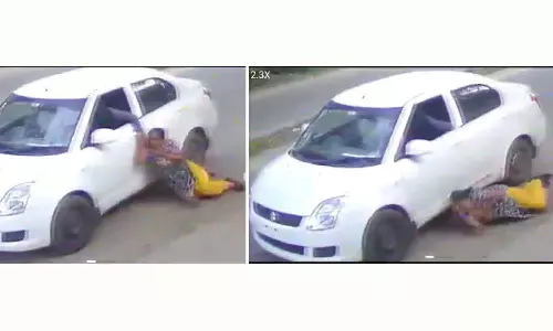 வழிப்பறி கொள்ளையரிடம் இருந்து அதிர்ஷ்டவசமாக உயிர் தப்பிய பெண்- போலீஸ் விசாரணை