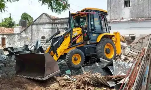 திருப்பூர் அருகே ரூ.10 கோடி மதிப்பிலான ஆக்கிரமிப்பு நிலம் மீட்பு - வருவாய் துறை அதிகாரிகள் நடவடிக்கை