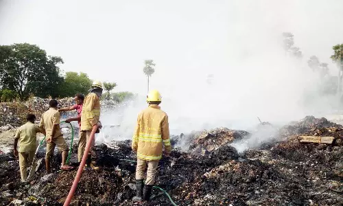 குப்பை கிடங்கில் திடீர் தீ