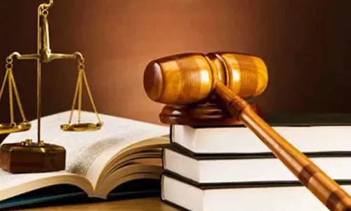 தேசிய மக்கள் நீதிமன்றத்தில் 722 வழக்குகளுக்கு சமரச தீர்வு