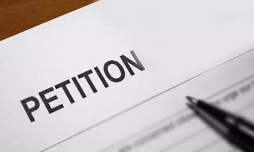 ஆக்கிரமிப்பை அகற்றக்கோரி மனு