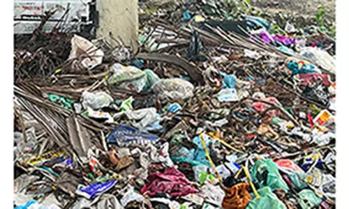 குவிந்து கிடக்கும் குப்பைகளை அகற்றாவிட்டால் போராட்டம்