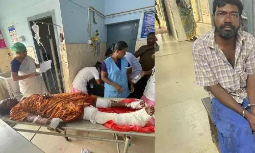 பழனி அரசு ஆஸ்பத்திரியில் மனைவியை அரிவாளால் வெட்டி கொல்ல முயன்ற கணவர்